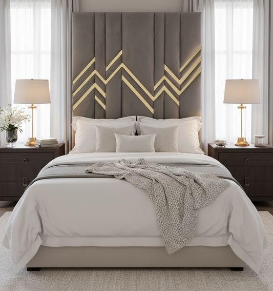 Luxurious bedroom with grey velvet headboard featuring gold chevron details